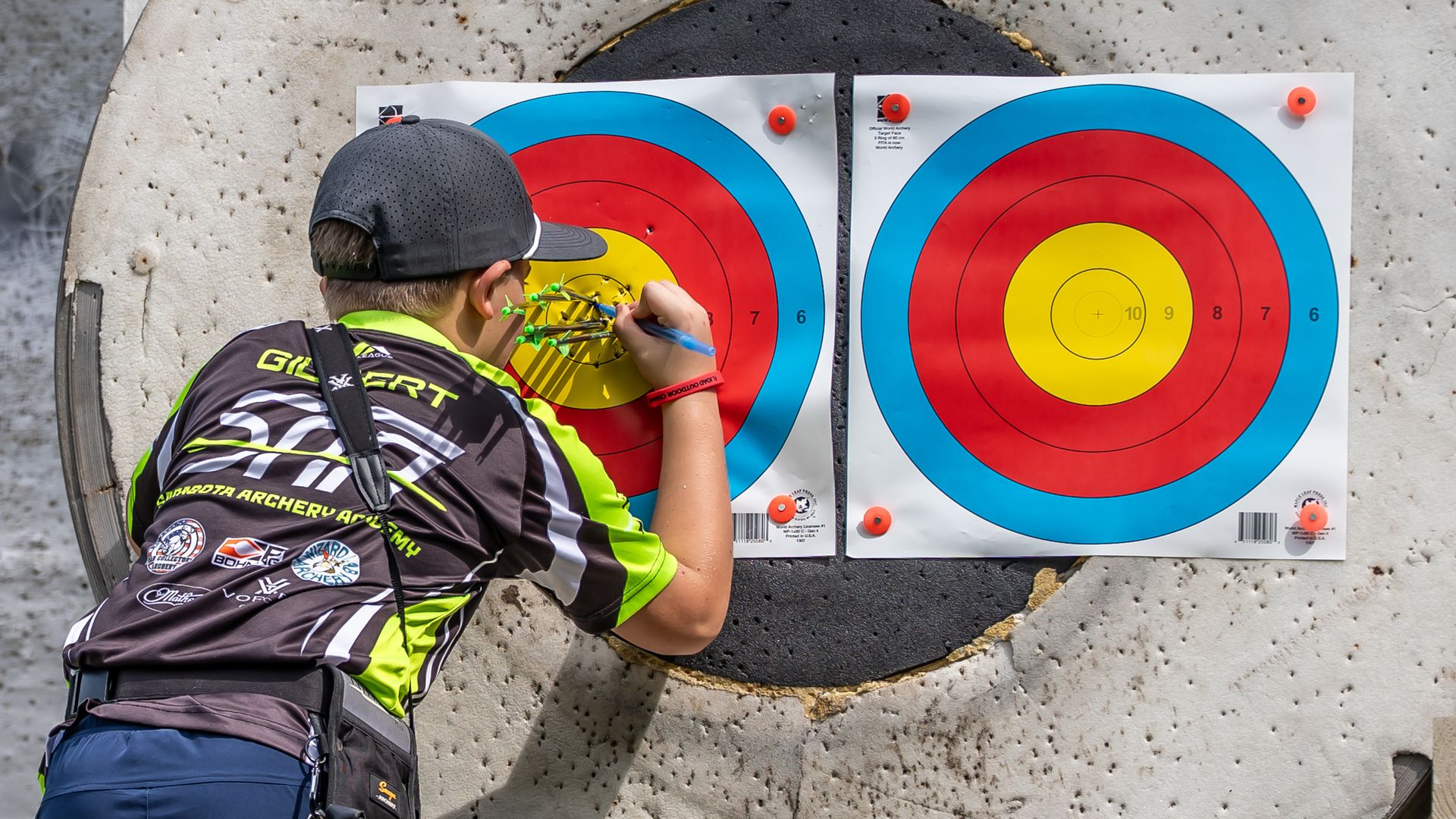 Youth archer scoring at USA Archery State 720 round, first place with 709 out of 720 in Sarasota, FL